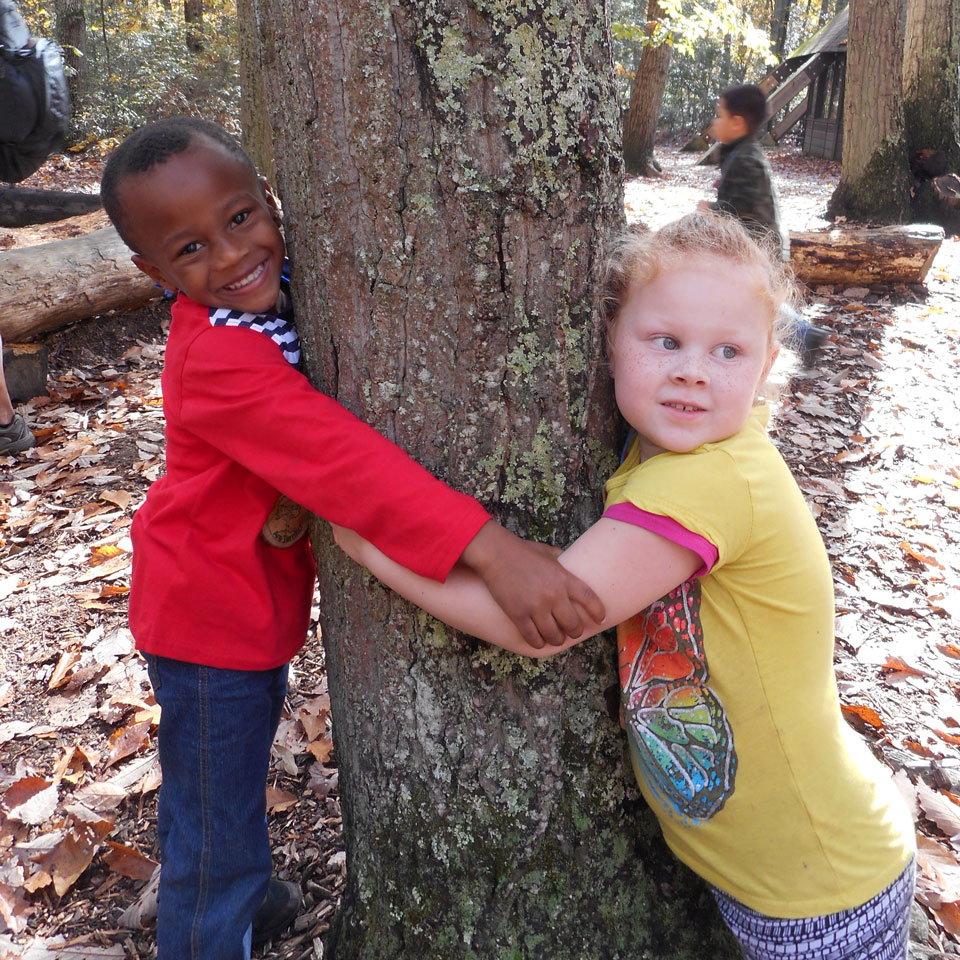 Kindergartners Hugging a Tree