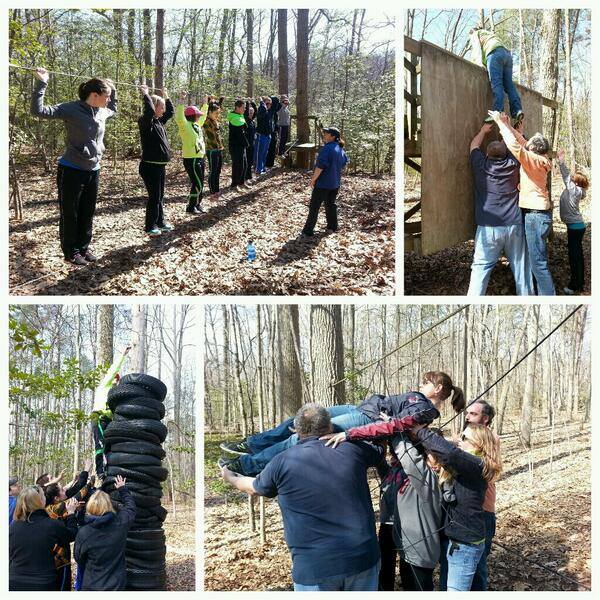 A collage of photos of adults walking a tightrope, one adult being lifted over a wall, an adult climbing a stack of tires and a adult being lifted through a web made of ropes. 